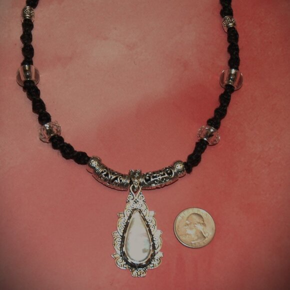 Elegant Opalescence Teardrop Cabochon on a 20" Handmade Black Hemp Necklace - Picture 5 of 7